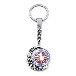 Rotating silver London keychain with UK flag and England map on textured crescent moon