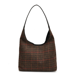 Brown and black plaid tote bag in woolen fabric with black leather shoulder strap