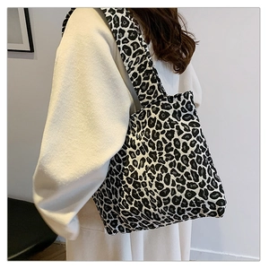 Close-up of black and white leopard print tote bag with thick fabric material