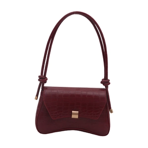Deep burgundy crocodile embossed shoulder bag with unique knot strap and gold metal lock