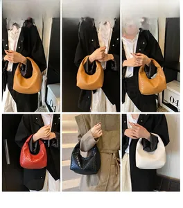 Detail view of woven hobo bags in multiple colors shown from various angles by a model