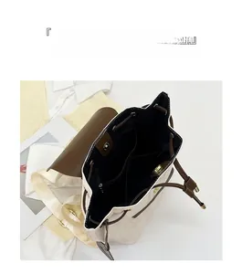 Vue de dessus du sac à dos seau montrant l'intérieur spacieux avec poches et cordon