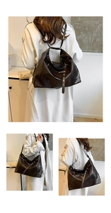 Detail view of dark brown faux leather hobo bag with adjustable multi-functional straps