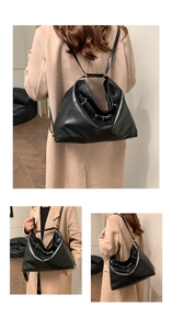 Three-angle view of black glossy leather crossbody bag with gold hardware on beige coat