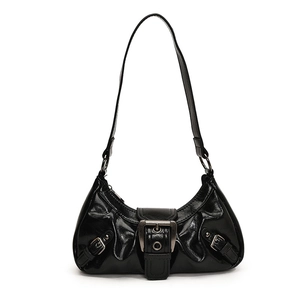 Glossy black patent leather shoulder bag with vintage silver metal buckles and retro styling