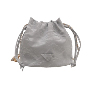 Grey ruched faux leather bucket bag with gold chain and triangle logo detail
