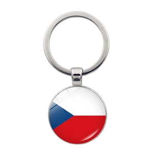 Detail of Czech Republic flag keychain with a round silver metal base and glass dome