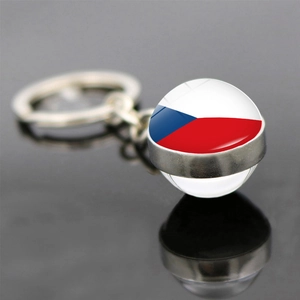 Macro shot of glass ball keychain with Czech Republic flag and silver metal ring