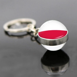Double-sided glass ball keychain featuring the Poland national flag for football fans
