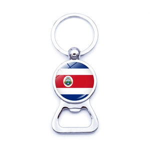 Detailed close-up of Costa Rica flag bottle opener keychain with polished metal finish