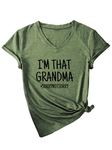 Detail of rolled sleeves and side-knot hem on olive green V-neck grandma t-shirt