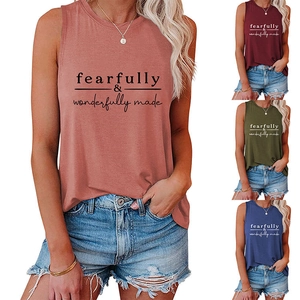 Detail view of cotton racerback tank tops in pink, red, green and blue color options