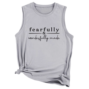 Detail of light grey muscle tee featuring front text print and stylish side knot design