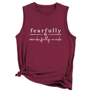 Detail of burgundy tank top showing the fearfully wonderfully made print and knotted hem