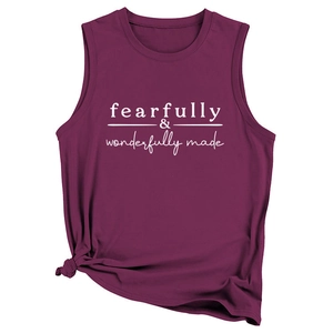 Detail of burgundy sleeveless vest with fearfully wonderfully made print and knotted hem