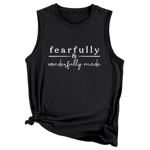 Detail view of cotton tank top with fearfully wonderfully print and knotted hem