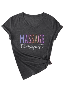 Detail of rolled sleeves and knotted hem on a Massage Therapist V-neck gray t-shirt