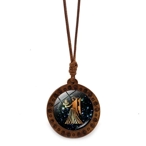 Handcrafted wooden Virgo constellation pendant with blue starry glass gem on brown cord