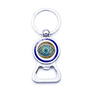 Porte-clés décapsuleur en métal argenté avec amulette œil bleu et finition polie