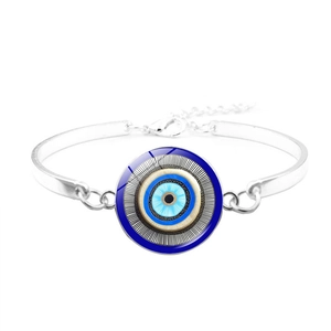 Silver Evil Eye bracelet with blue glass charm and adjustable clasp on white background