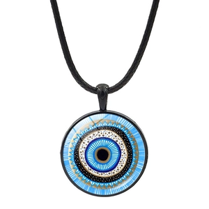 Close-up of the Turkish Evil Eye mandala pendant on a black cord necklace