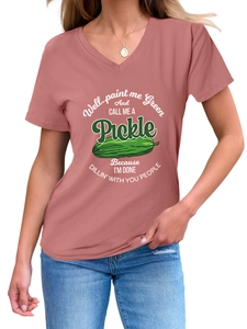 Detail of pink V-neck T-shirt featuring green pickle print and humorous text on the chest