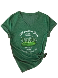 Detail shot of green V-neck T-shirt with pickle graphic print and stylish front hem knot