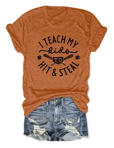 Close-up of rust t-shirt with baseball print and distressed denim shorts on white background