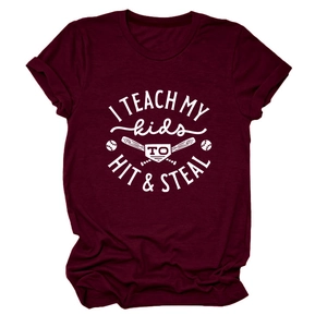 Close-up of I TEACH MY KIDS white graphic print on deep red cotton crew neck t-shirt