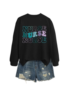 Close-up of black nurse sweatshirt with retro lettering and distressed denim shorts set