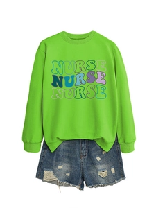Detail of neon green long sleeve sweatshirt featuring wavy Nurse typography print