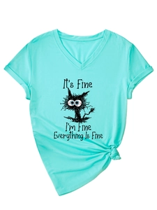 Detail of mint green V-neck T-shirt with 'It's Fine' cat graphic and knotted hemline