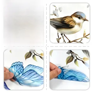 Detailweergave van vogel- en vlindermuurstickers met doorschijnende textuur en rug
