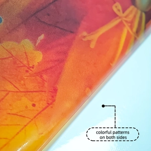 Detail showing autumn maple leaf patterns with double-sided colorful printing on the decal