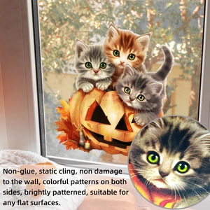 Detail of Halloween window stickers featuring realistic cats, pumpkins, and static cling tech