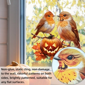 Detail of static Halloween window stickers featuring pumpkin and birds with maple leaves