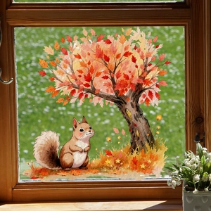 Detail of autumn watercolor window sticker featuring a red maple tree and squirrel decal