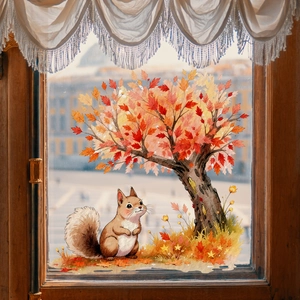 Detailed view of autumn window stickers featuring squirrel and orange maple tree decor
