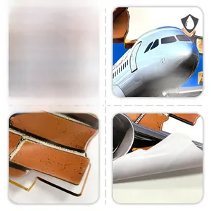 Detail of waterproof airplane wall sticker showing front texture and adhesive back layer