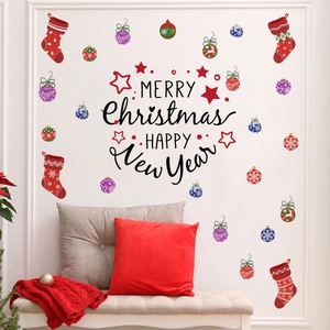 Festive Christmas wall stickers with red socks and colorful ornaments on a white wall
