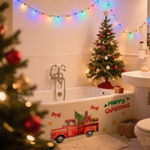 Macro detail of Merry Christmas stickers with red truck and tree on bathroom bathtub