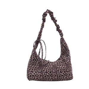 Leopard print hobo bag with ruched shoulder strap and decorative side ribbons