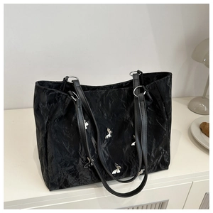 Black pleated tote bag with silver butterfly charms and large capacity for daily commuting
