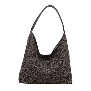 Minimalist leopard print shoulder tote bag with black straps and crescent shape