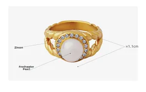 Detail of gold titanium ring with freshwater pearl and zircon stones with measurements
