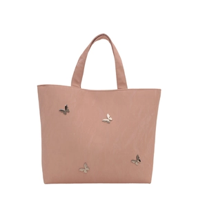 Pink oversized tote bag with silver butterfly charms and textured finish for commuting