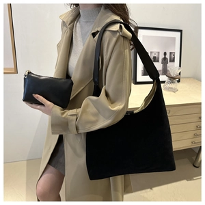 Retro black matte tote bag set with large capacity and matching pouch on a model