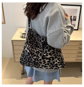 Leopard print canvas tote bag showcased in a cozy lifestyle indoor scene