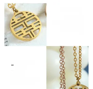 Close-up of 18K gold plated Double Happiness pendant with surgical titanium steel chain