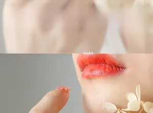 Detail of pink press-on nails with elegant pearls and gold foil accents on a model